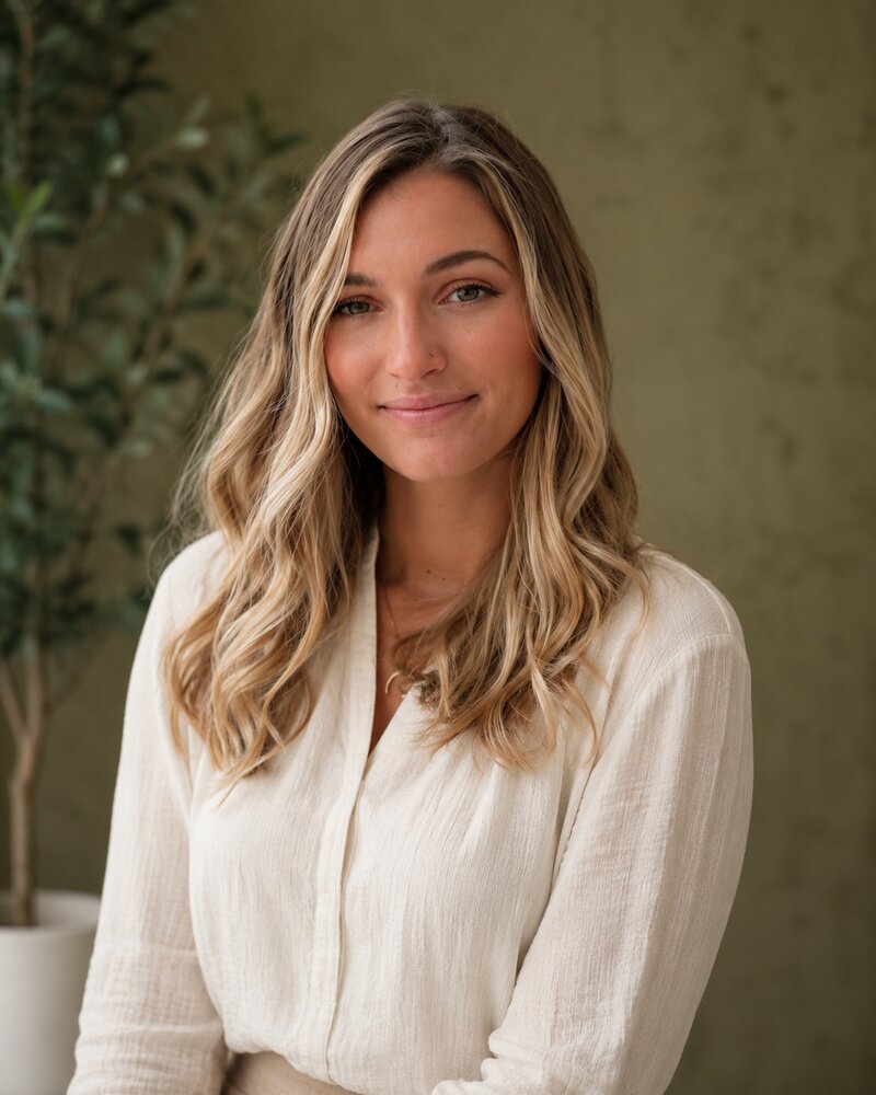 Portrait of Emily Light, MSN, APRN, PMHNP-BC, board-certified psychiatric mental health nurse practitioner at New Leaf Psychiatric Associates